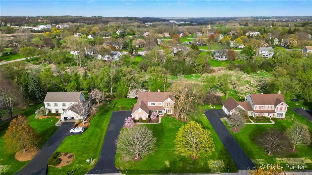 3910 Tecoma Drive Crystal Lake, IL 60012 - Photo 49 of 54 an aerial view of a house with a yard