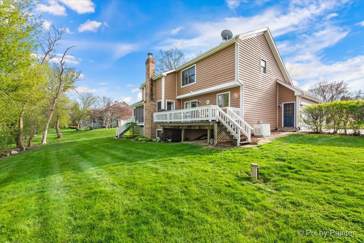 3910 Tecoma Drive Crystal Lake, IL 60012 - Photo 5 of 54 a view of backyard of house with green space