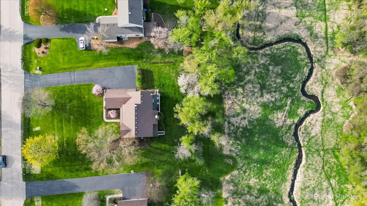 3910 Tecoma Drive Crystal Lake, IL 60012 - Photo 51 of 54 an aerial view of a house with a yard