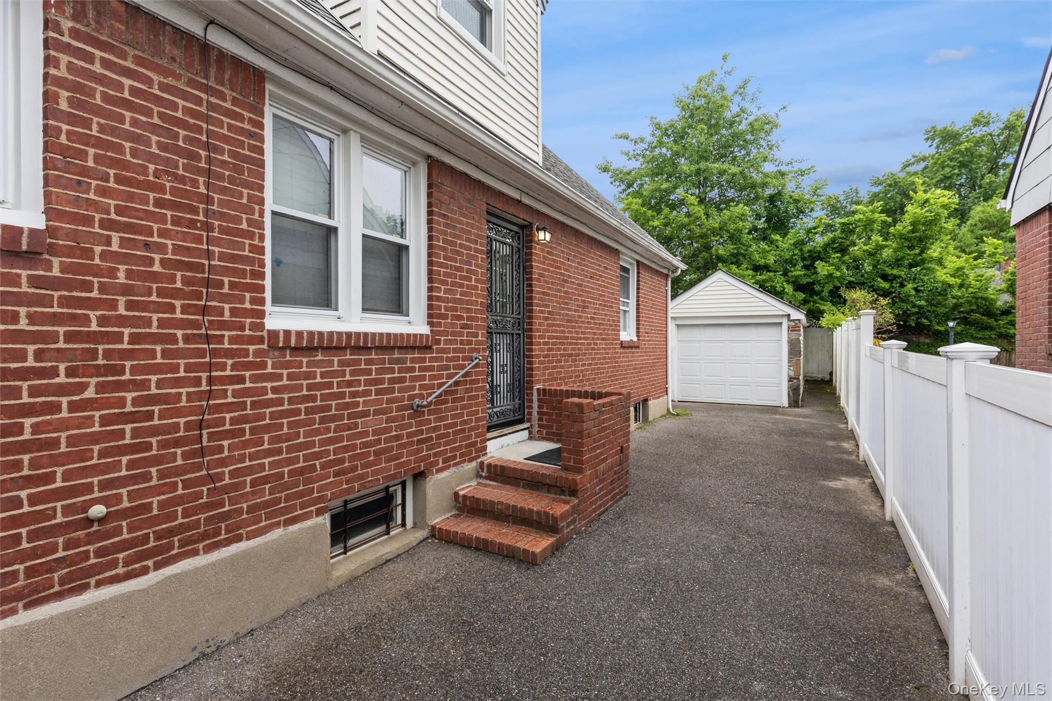 6 Jasper Street Valley Stream, NY 11580 - Photo 16 of 19 a view of a house with a yard