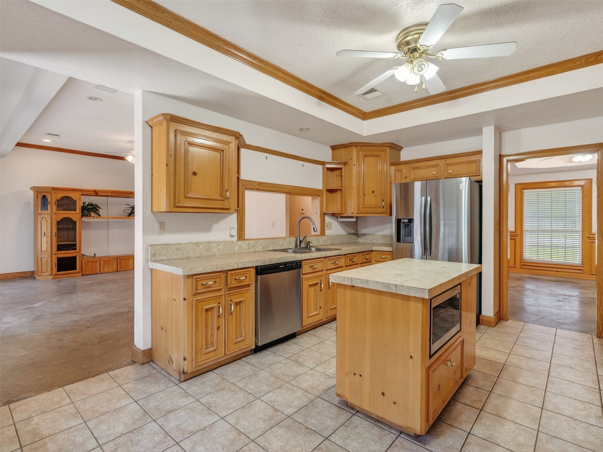 5036 Singletary Road Alvin, TX 77511 - Photo 15 of 35 Functional kitchen with abundant cabinetry, center island, and open flow to living areas.