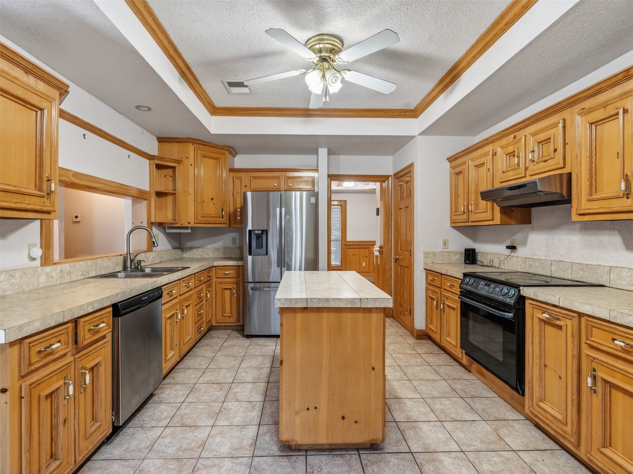5036 Singletary Road Alvin, TX 77511 - Photo 16 of 35 Spacious kitchen featuring ample counter space, storage, and a central island ideal for prep or seating.