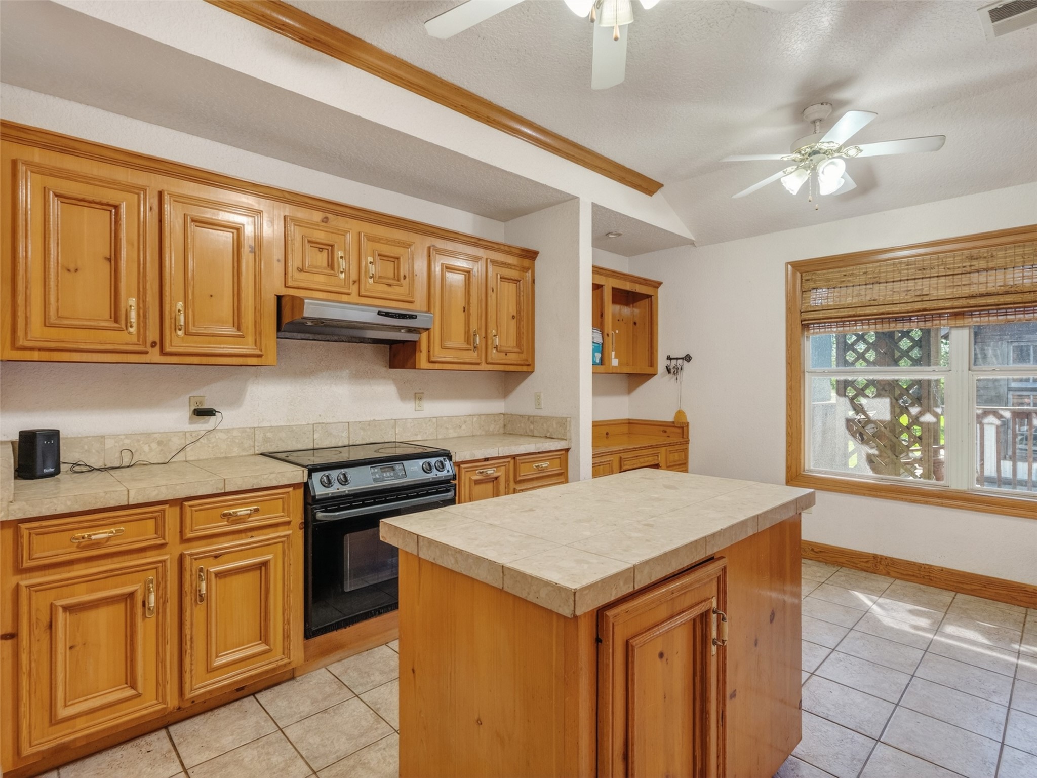 5036 Singletary Road Alvin, TX 77511 - Photo 17 of 35 Well-designed kitchen layout with stainless appliances, generous cabinetry, and easy access to dining and living areas.