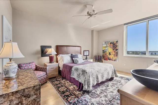 a living room with furniture a dining table and a piano