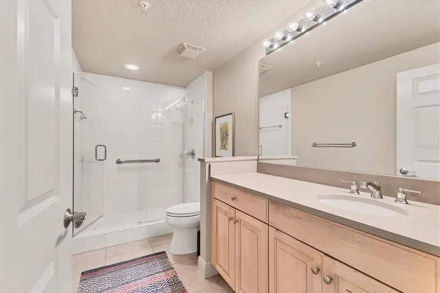 a view of a balcony with chairs