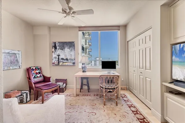 an aerial view of a house with a garden and lake view