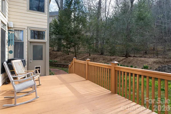 a view of a two chairs on the roof deck