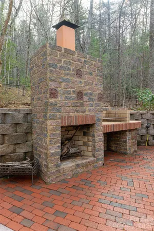 a brick building with a bench in it