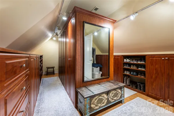 a view of a hallway with seating area