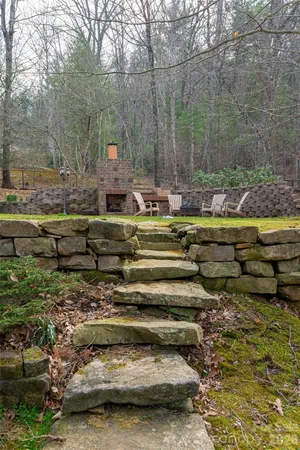 a view of swimming pool with a yard