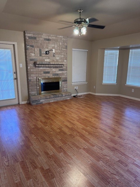 2425 Bevecrest Drive Corpus Christi, TX 78415 - Photo 5 of 11 a view of empty room with wooden floor and fireplace