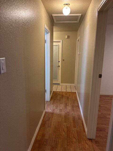 2425 Bevecrest Drive Corpus Christi, TX 78415 - Photo 7 of 11 a view of a hallway with wooden floor and staircase