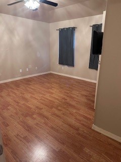 2425 Bevecrest Drive Corpus Christi, TX 78415 - Photo 9 of 11 a view of an empty room with wooden floor and a window