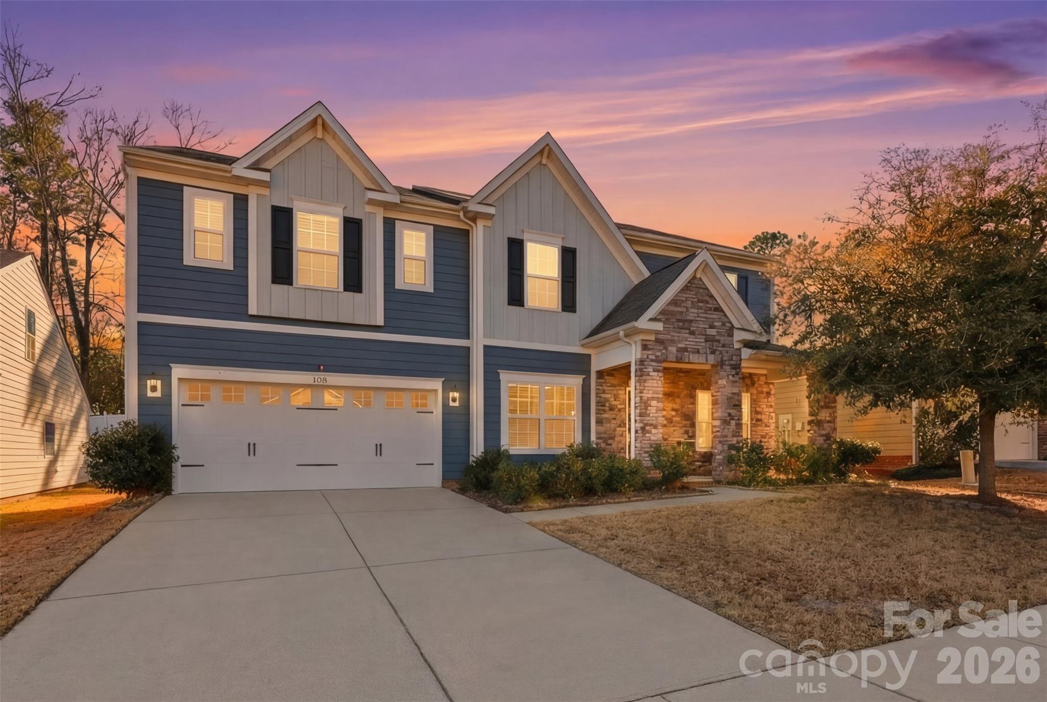 1722 Still River Way Fort Mill, SC 29708 - Photo 2 of 45 a view of a white house with large windows
