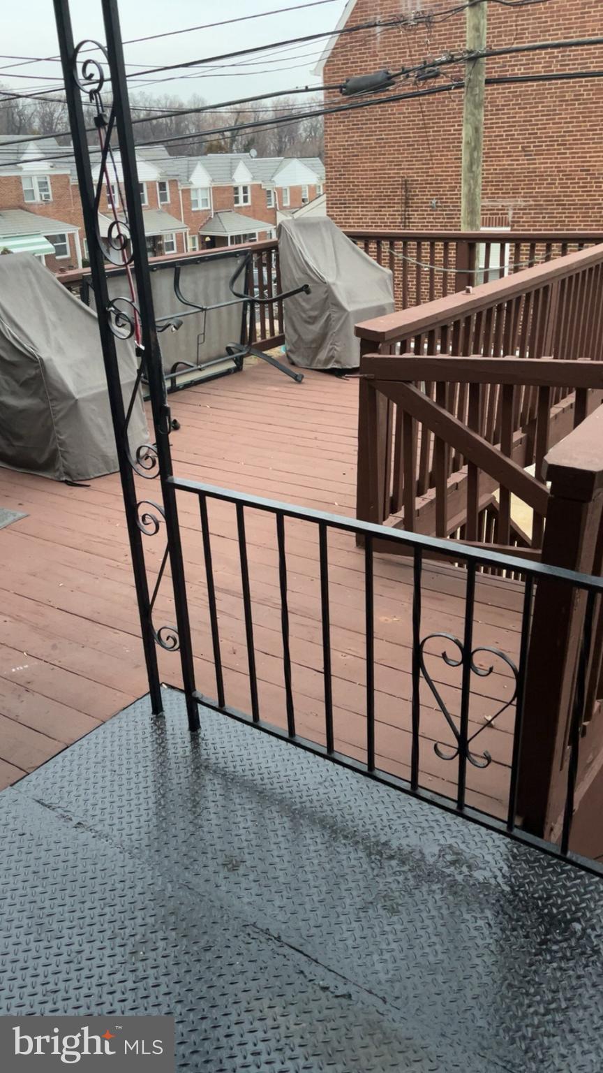 839 Lyndhurst Street Baltimore, MD 21229 - Photo 11 of 16 Rear of the House with Deck