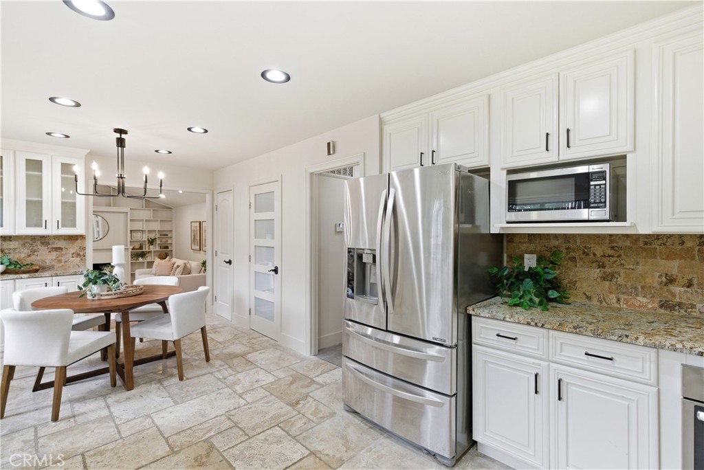 21630 Edward Way Cupertino, CA 95014 - Photo 13 of 59 a kitchen with stainless steel appliances a refrigerator sink and microwave