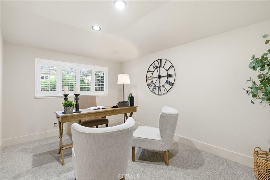 21630 Edward Way Cupertino, CA 95014 - Photo 23 of 59 a white table and chair in a room