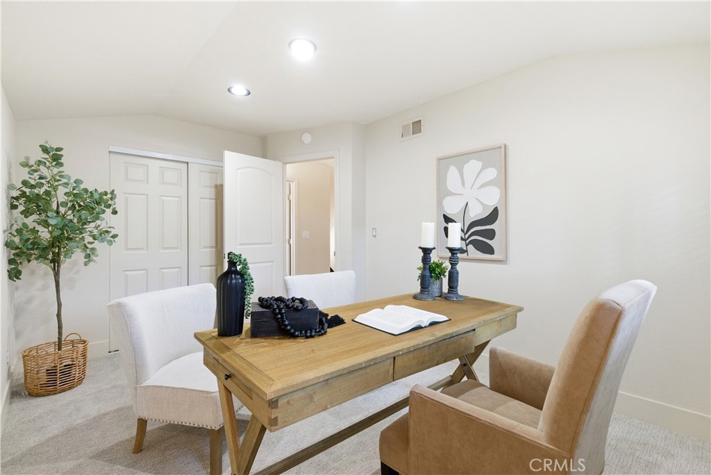 21630 Edward Way Cupertino, CA 95014 - Photo 24 of 59 a dining room with furniture and potted plants