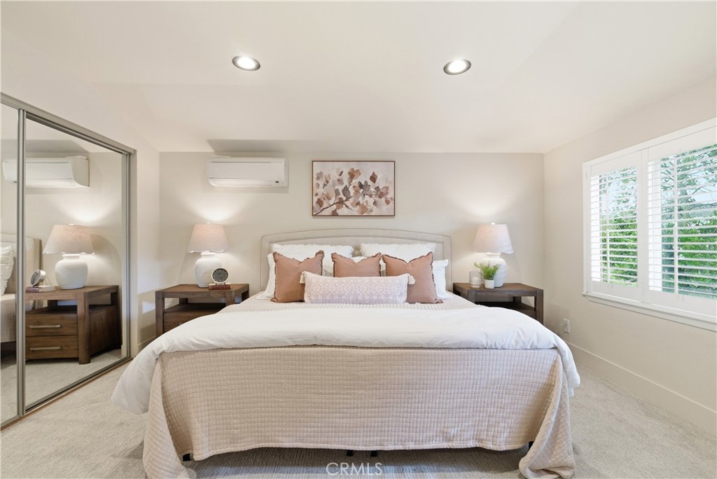 21630 Edward Way Cupertino, CA 95014 - Photo 25 of 59 a bedroom with a bed and wooden floor