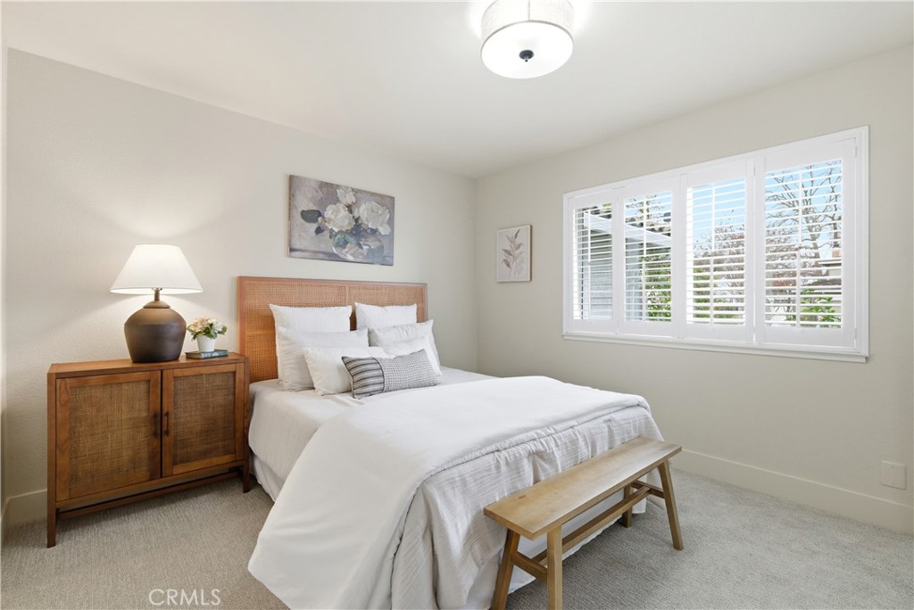 21630 Edward Way Cupertino, CA 95014 - Photo 27 of 59 a bedroom with a bed and window