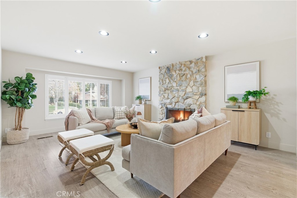 21630 Edward Way Cupertino, CA 95014 - Photo 6 of 59 a living room with furniture and a large window