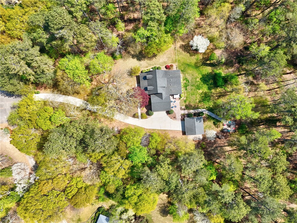 1010 Ridgeview Drive Pendleton, SC 29670 - Photo 47 of 47 An aerial view showcases a residential property nestled amidst lush, mature trees and natural landscaping.