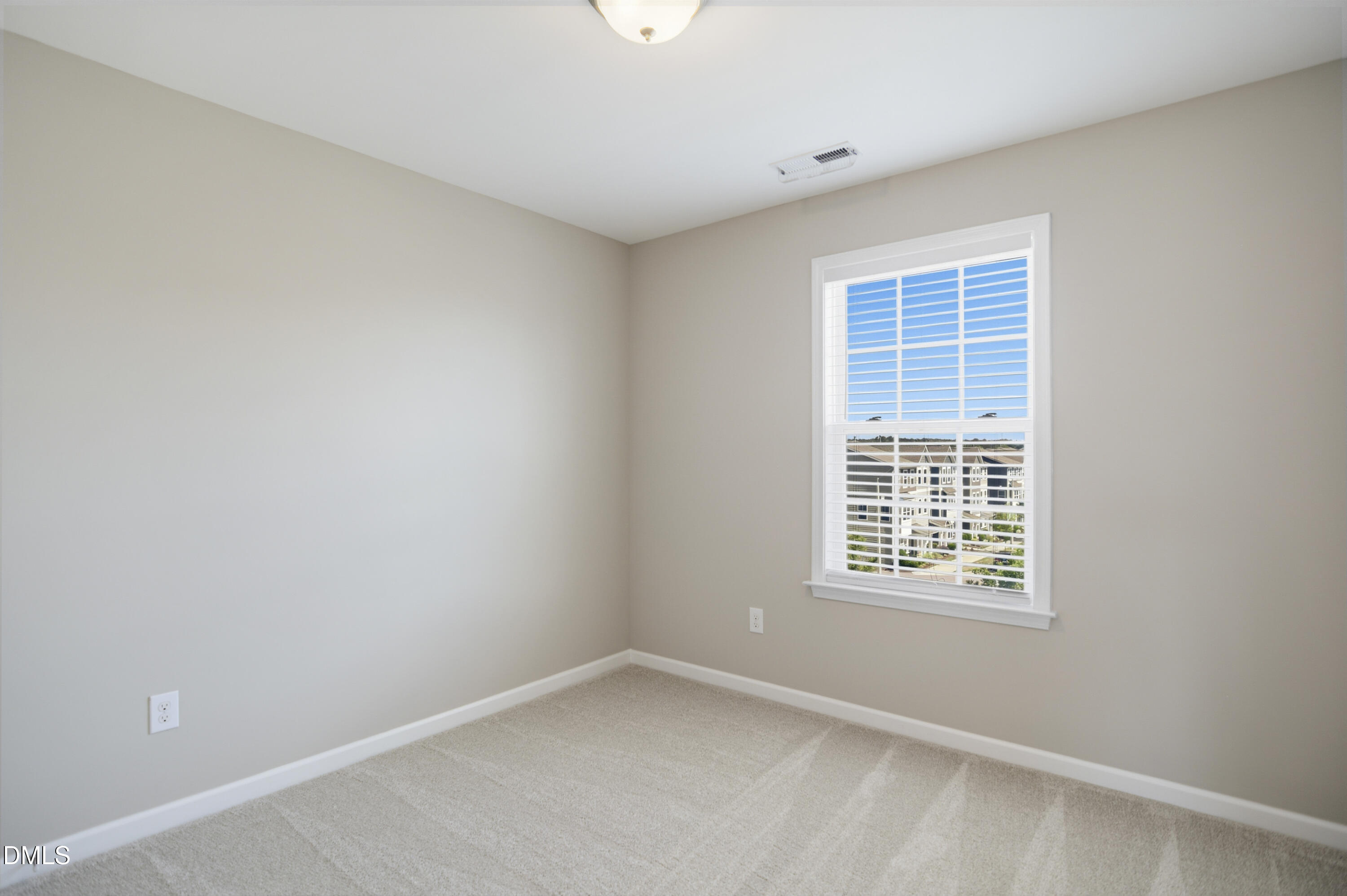 5916 Giddings Street Raleigh, NC 27616 - Photo 24 of 49 an empty room with a window