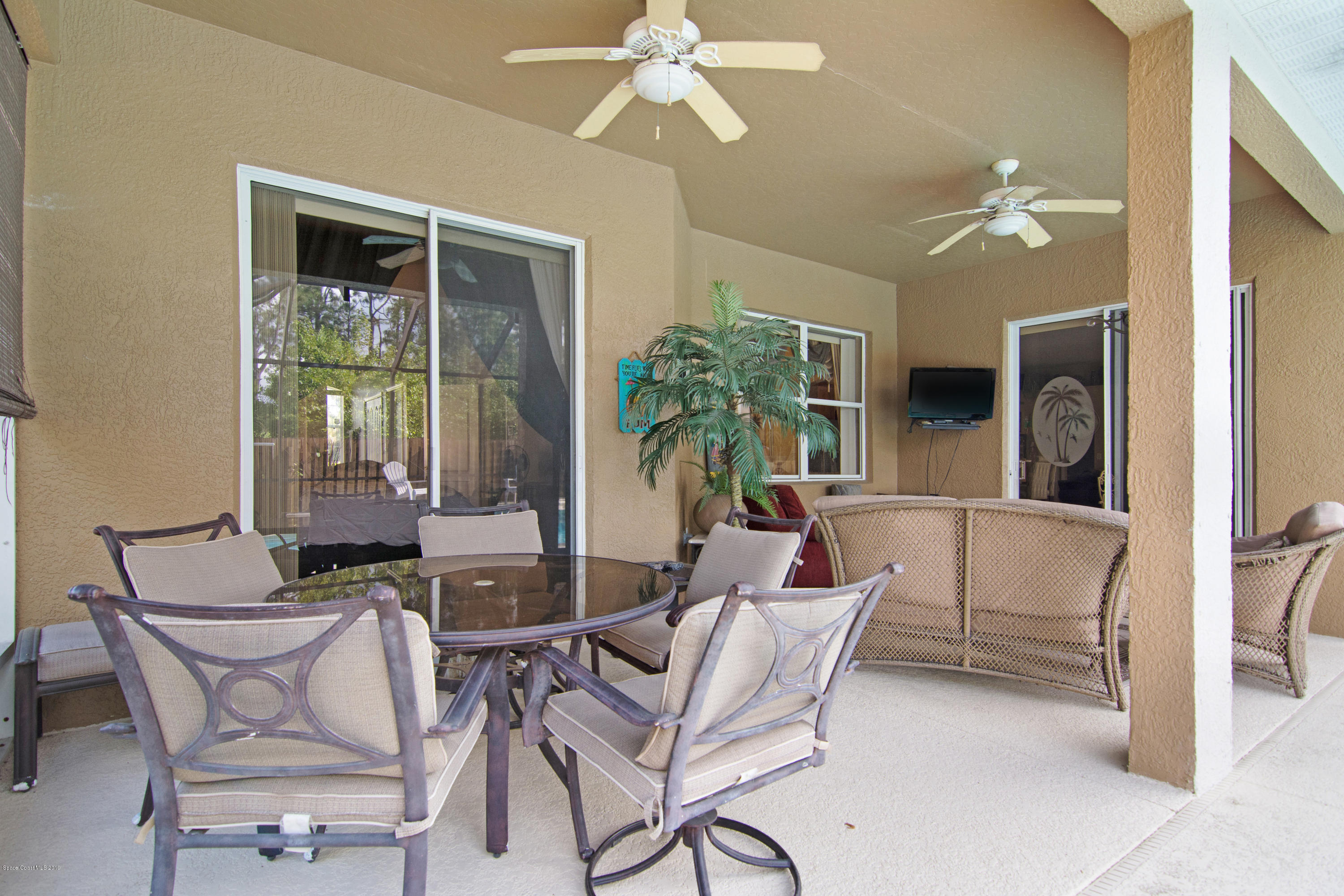 771 Raleigh Road Southeast Palm Bay, FL 32909 - Photo 22 of 37 Covered Patio