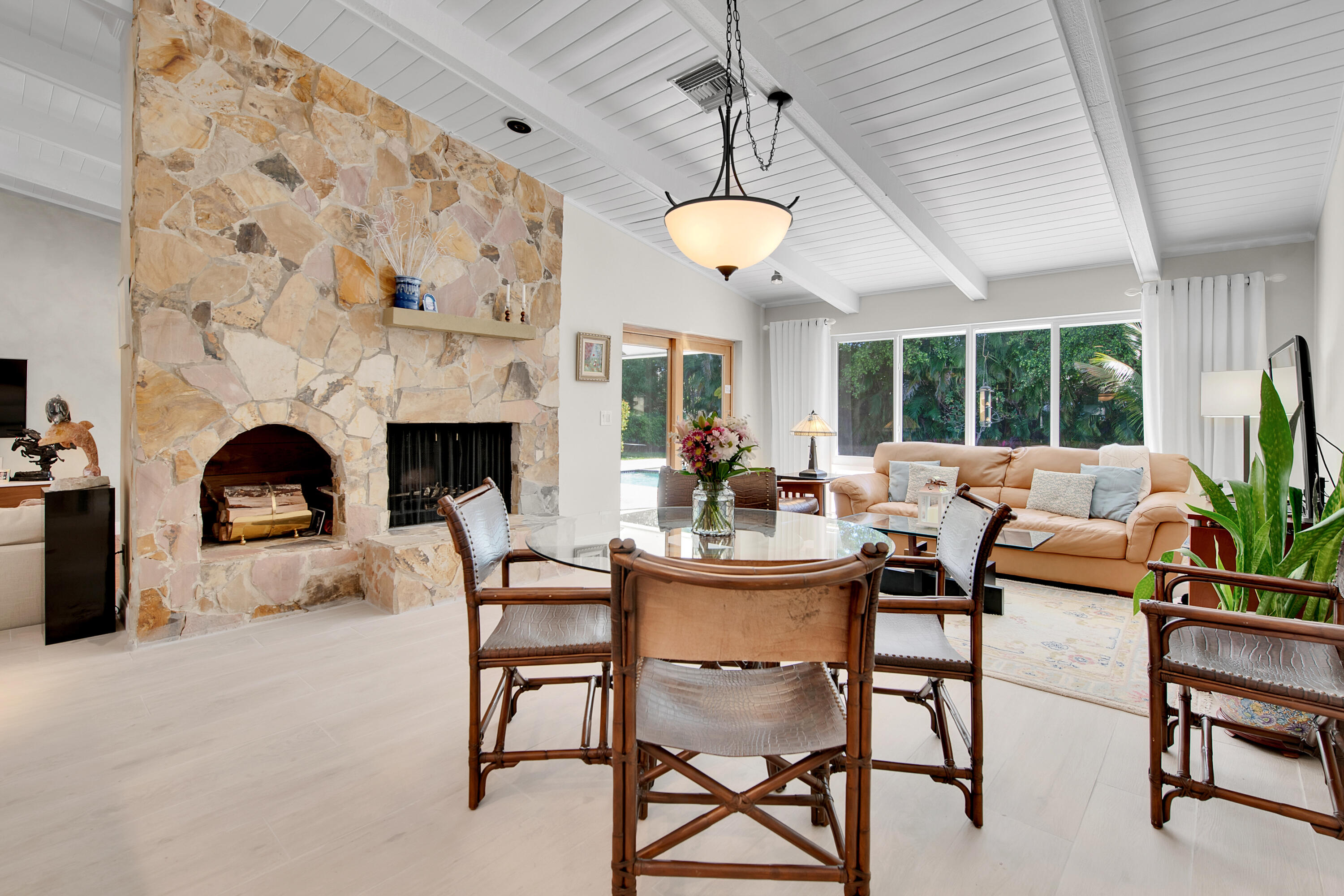 2932 Banyan Blvd Circle Northwest Boca Raton, FL 33431 - Photo 18 of 57 a view of a livingroom with furniture and a fireplace