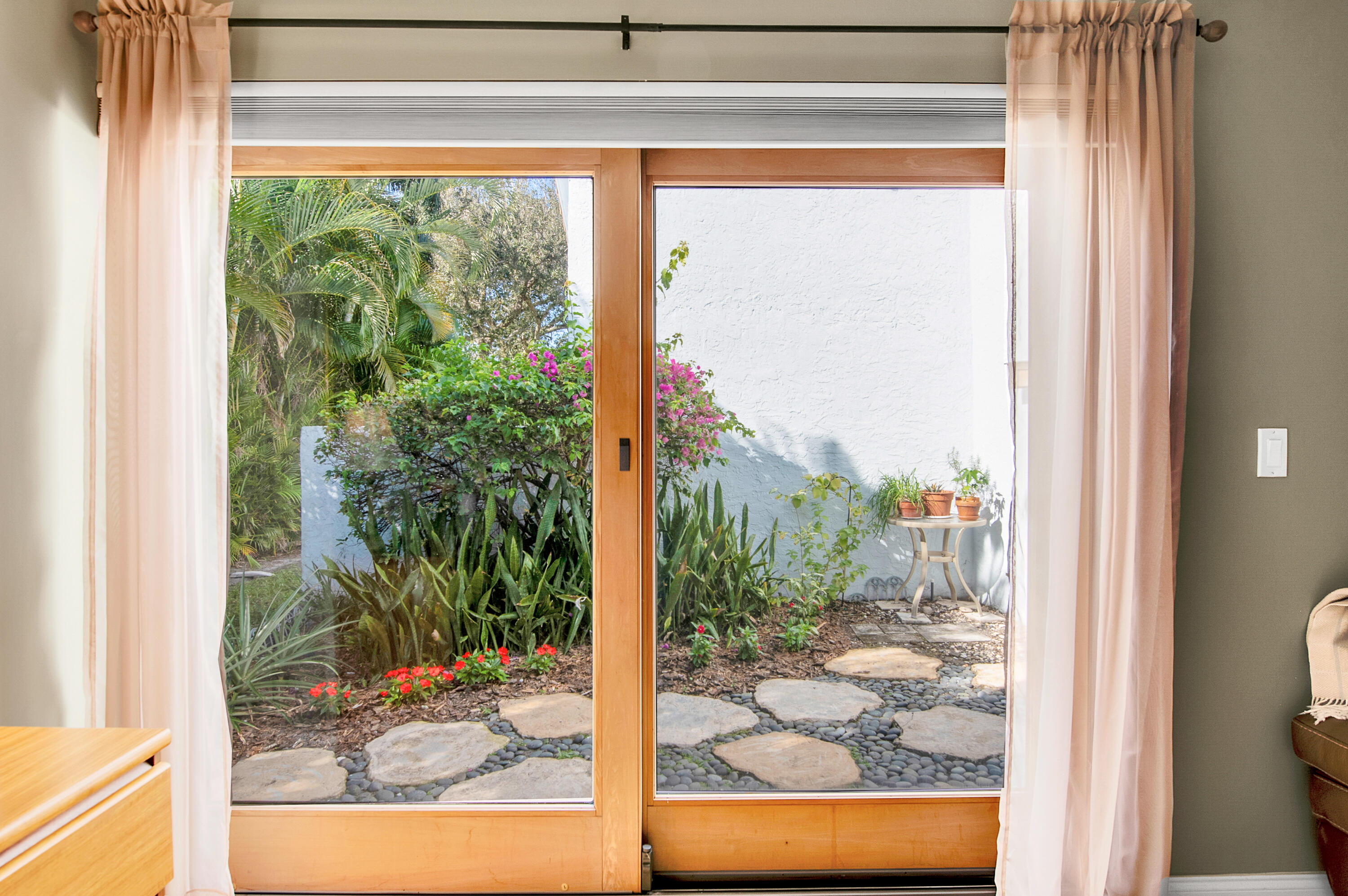 2932 Banyan Blvd Circle Northwest Boca Raton, FL 33431 - Photo 24 of 57 a view of a room with a large window and front door