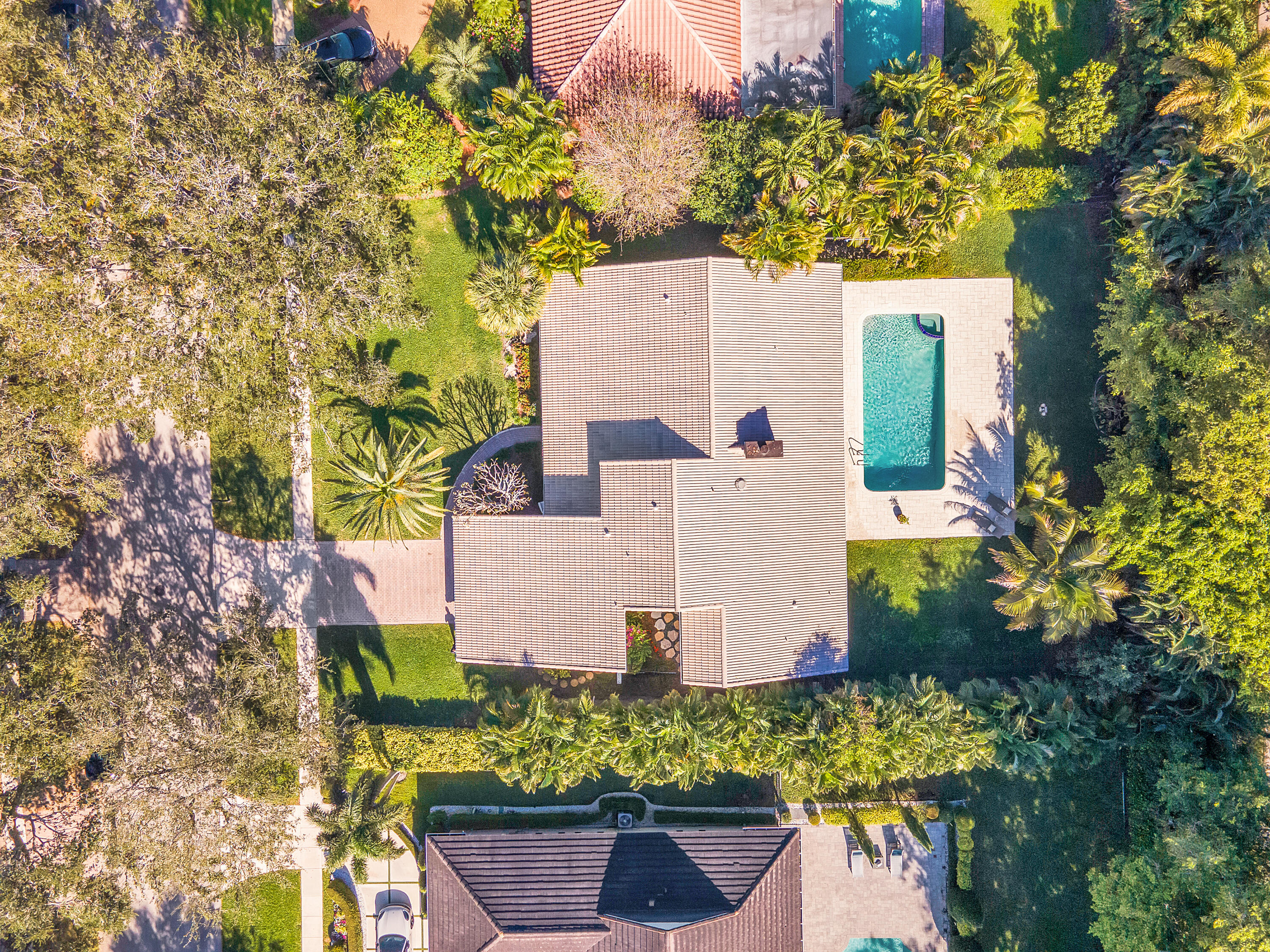 2932 Banyan Blvd Circle Northwest Boca Raton, FL 33431 - Photo 33 of 57 an aerial view of a house with a garden