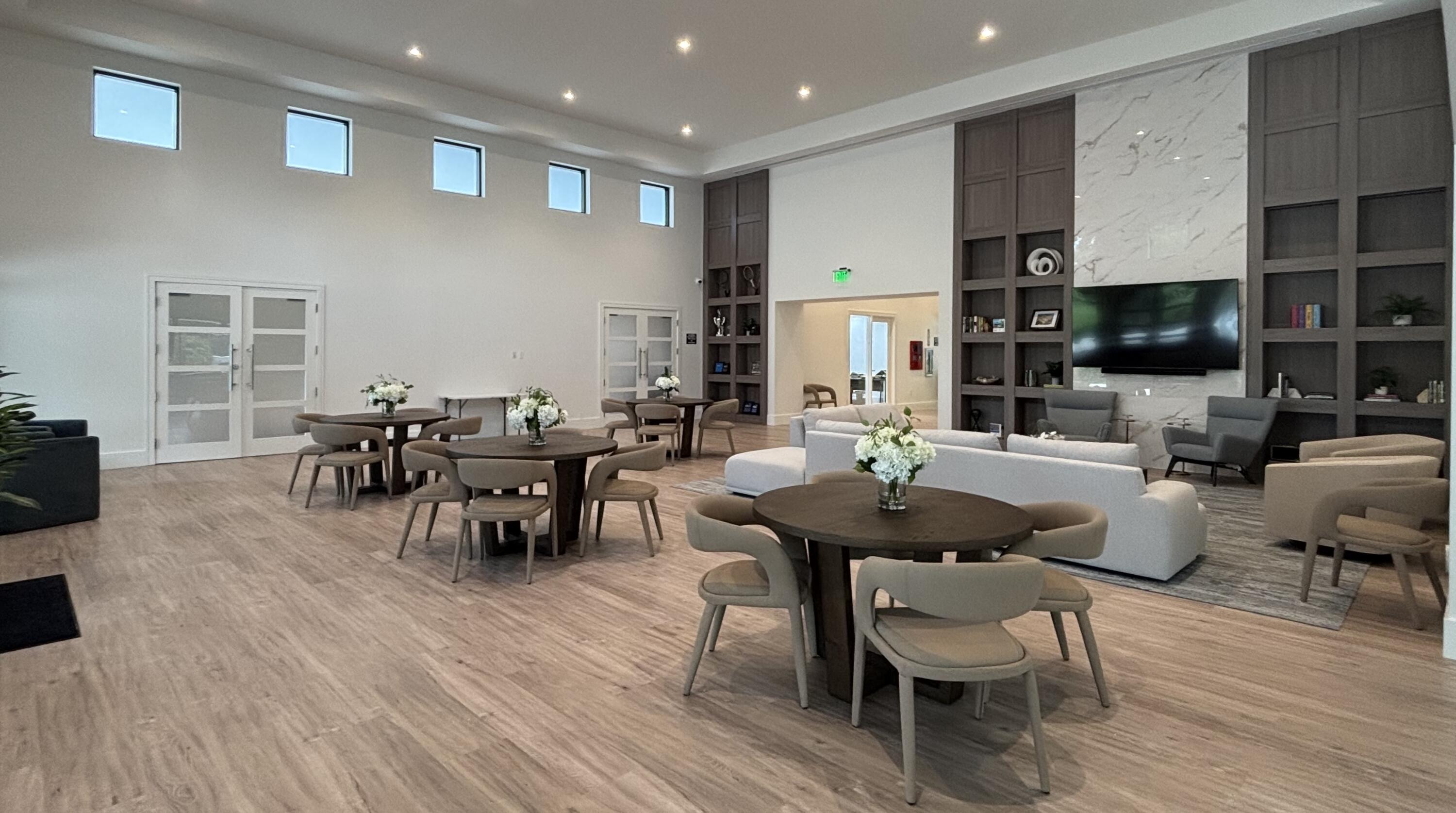 2932 Banyan Blvd Circle Northwest Boca Raton, FL 33431 - Photo 49 of 57 a view of a dining room with furniture and wooden floor