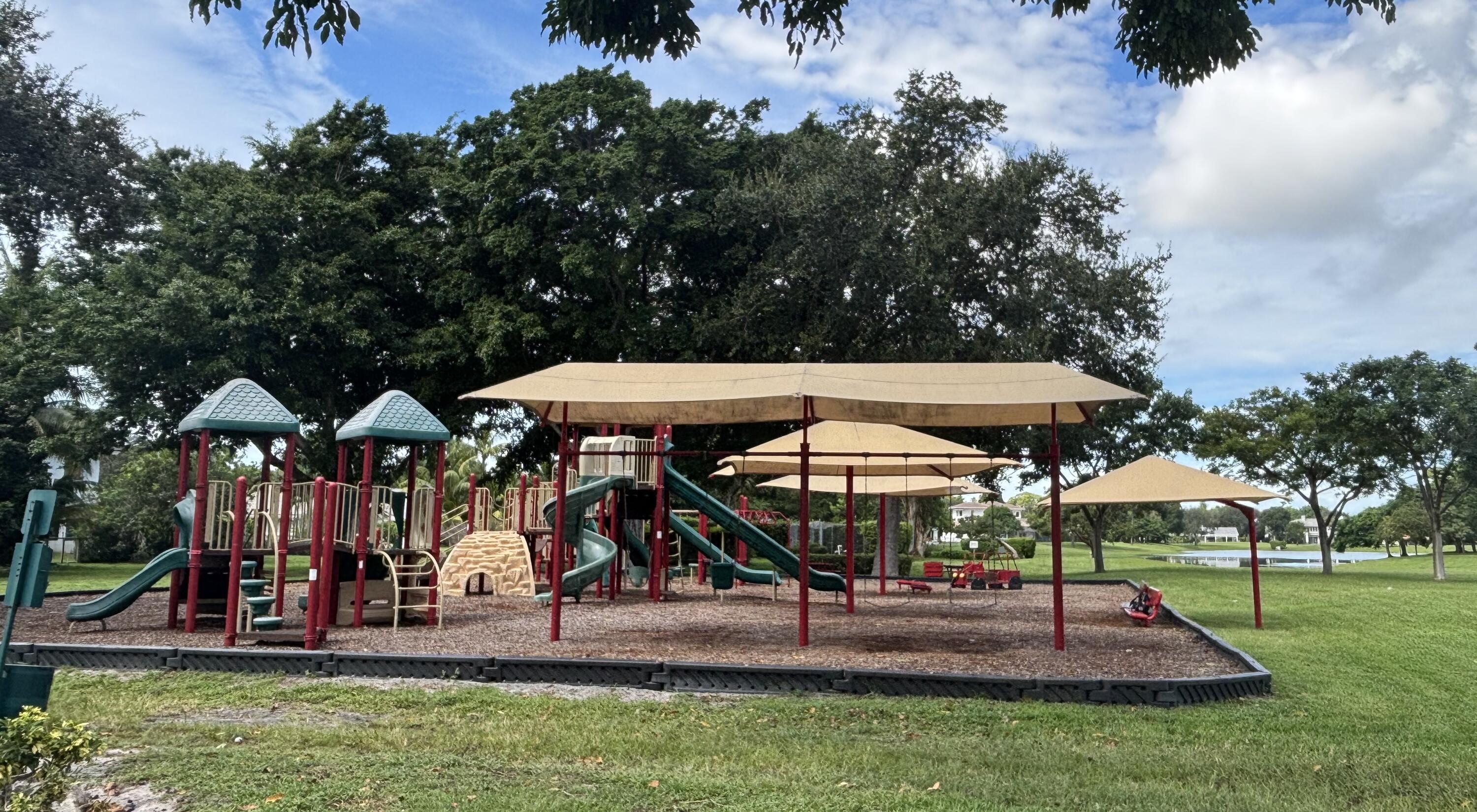 2932 Banyan Blvd Circle Northwest Boca Raton, FL 33431 - Photo 53 of 57 an outdoor space with furniture and garden