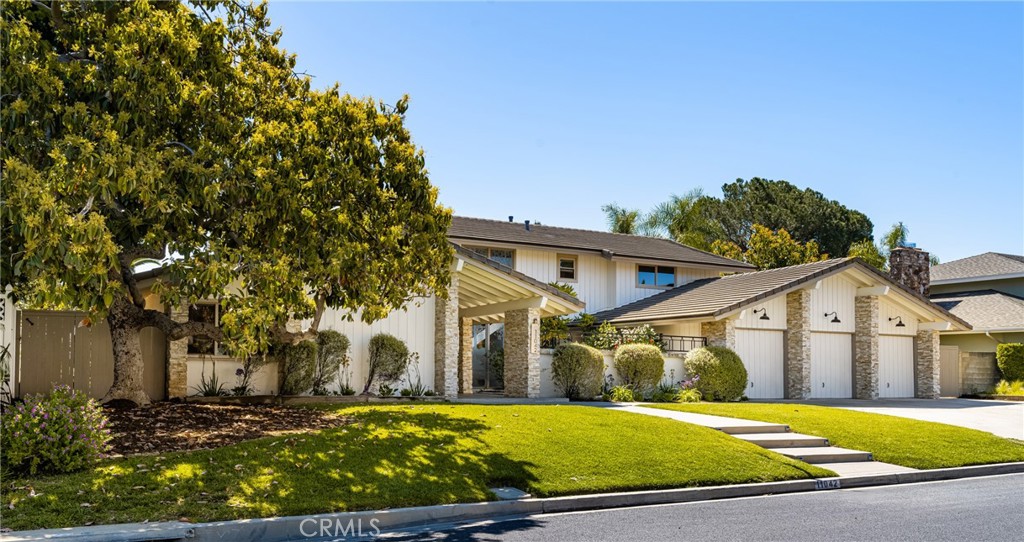 Welcome to this 3843 SF stunner on an expansive view lot on oneof North Tustin's most sought-after hilltop streets!
