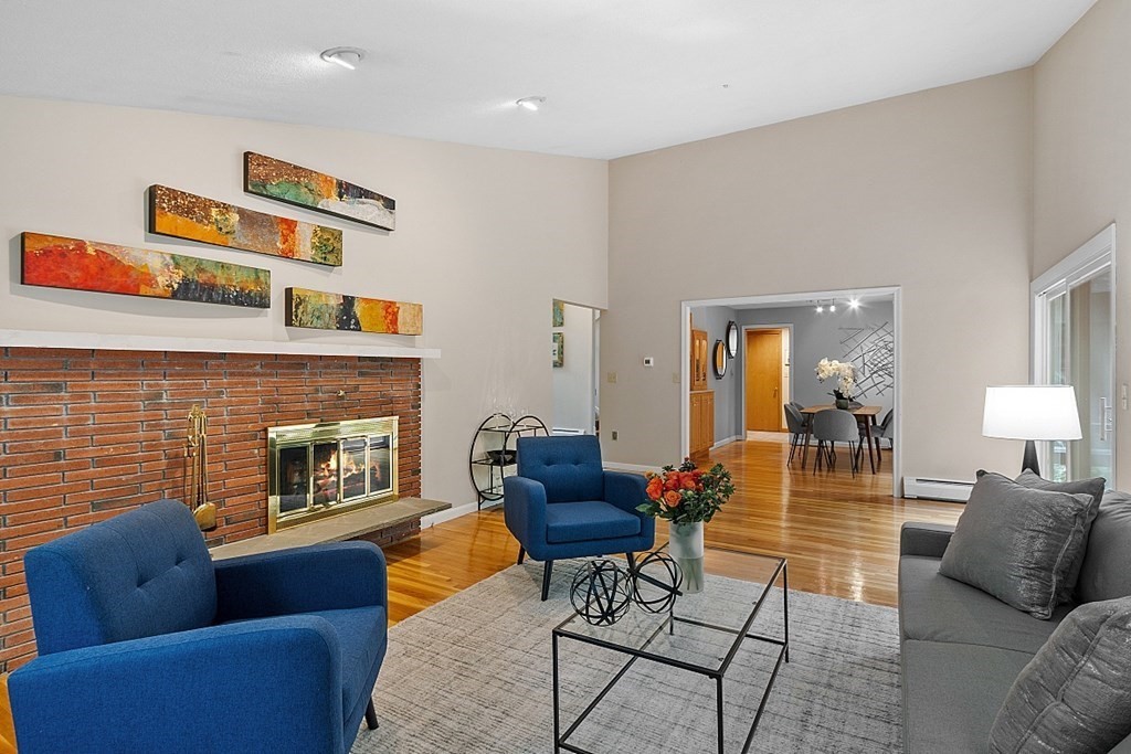 315 College Road Concord, MA 01742 - Photo 3 of 38 a living room with furniture and a fireplace