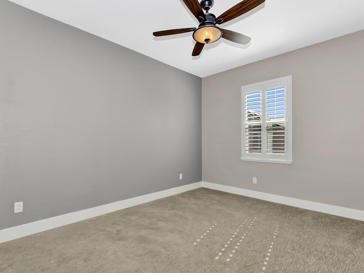 1311 Amalfi Court San Ramon, CA 94583 - Photo 19 of 59 an empty room with window and a ceiling fan