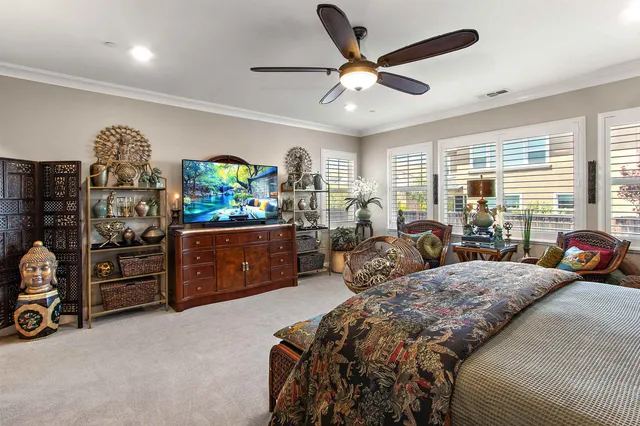 a kitchen with a sink a stove and cabinets