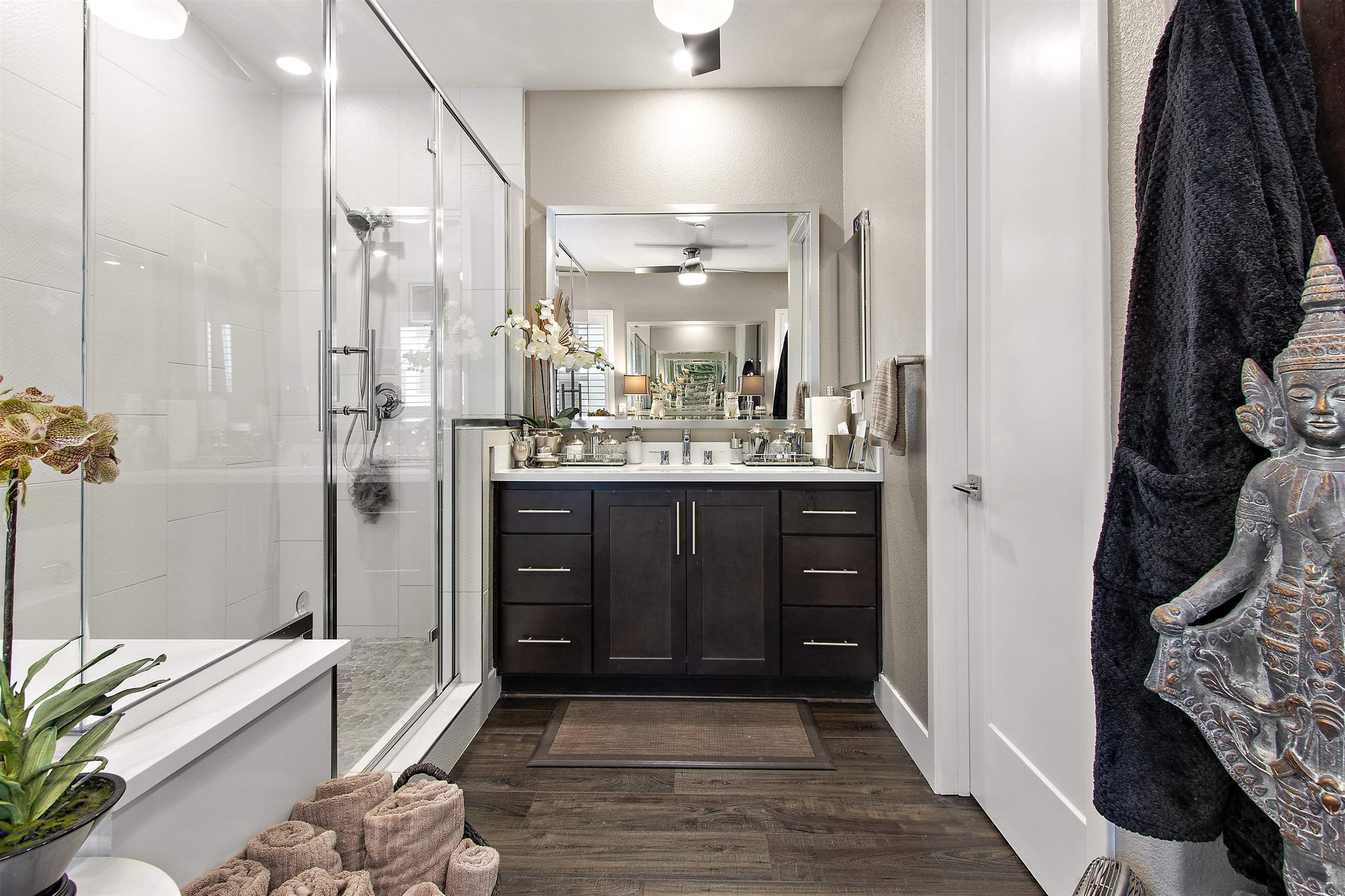 1311 Amalfi Court San Ramon, CA 94583 - Photo 33 of 59 a bathroom with a granite countertop sink a mirror and a shower