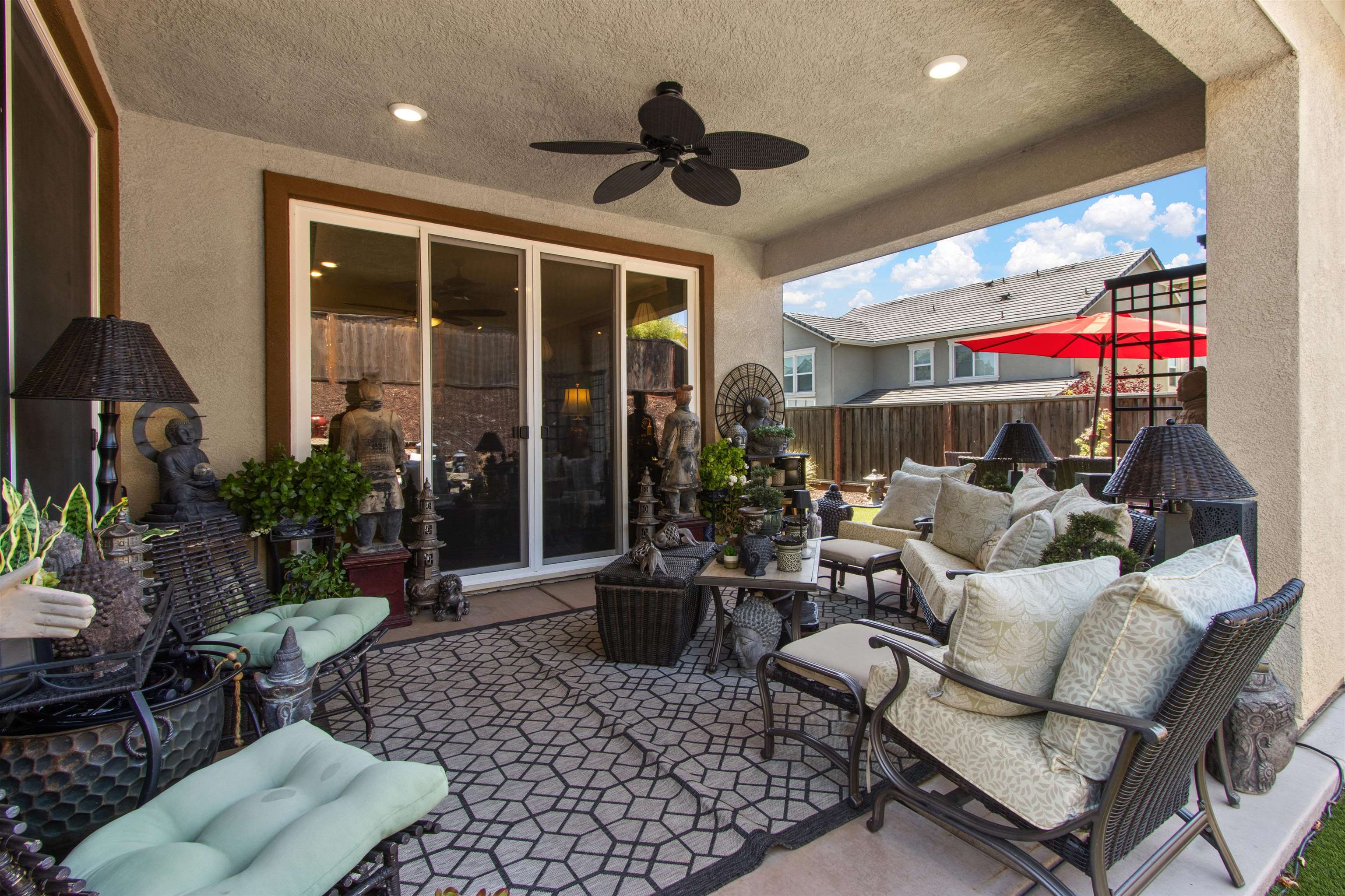 1311 Amalfi Court San Ramon, CA 94583 - Photo 41 of 59 a living room with patio a couch and a potted plant