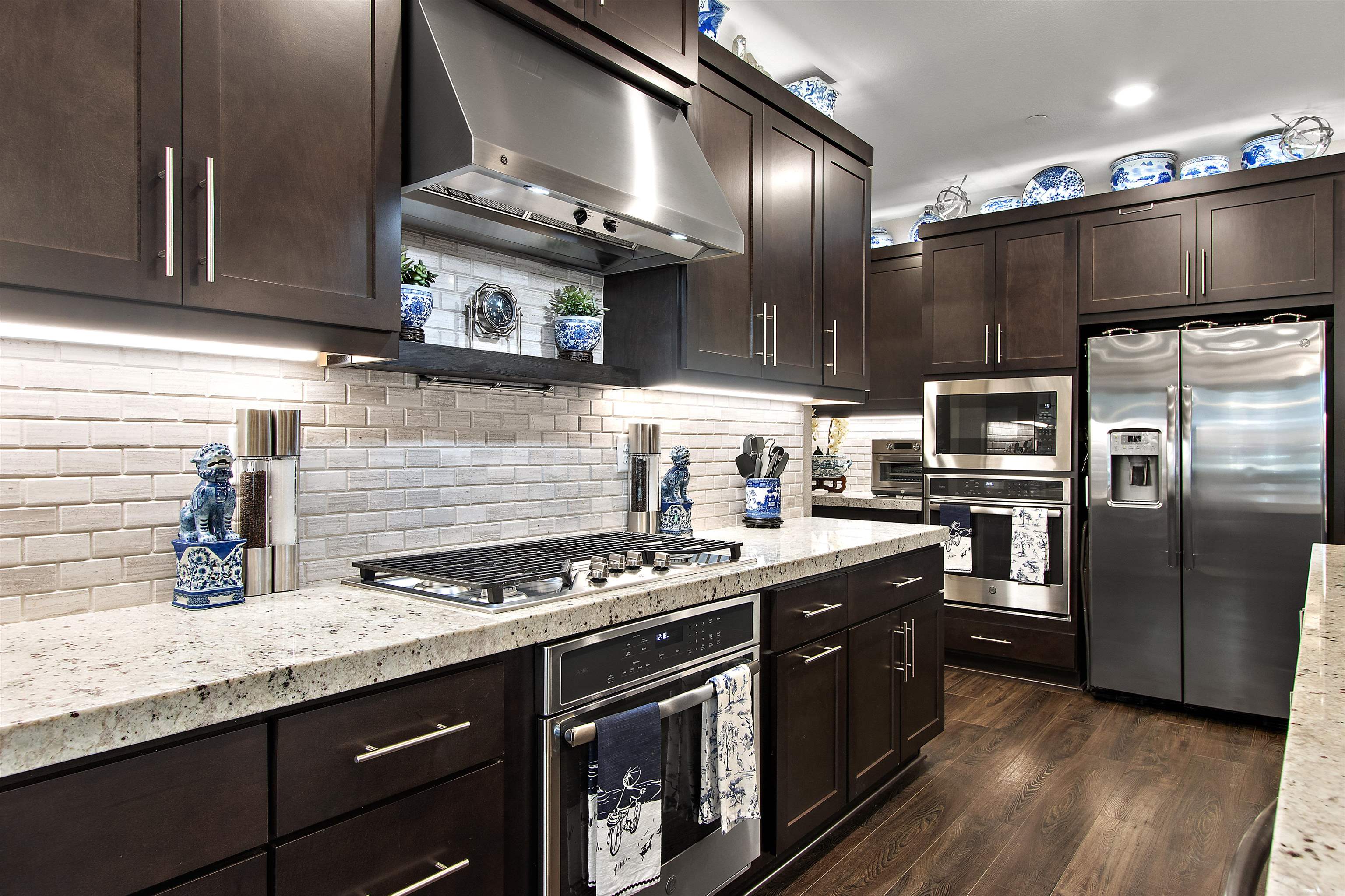 1311 Amalfi Court San Ramon, CA 94583 - Photo 10 of 59 a kitchen with stainless steel appliances granite countertop a stove and a sink