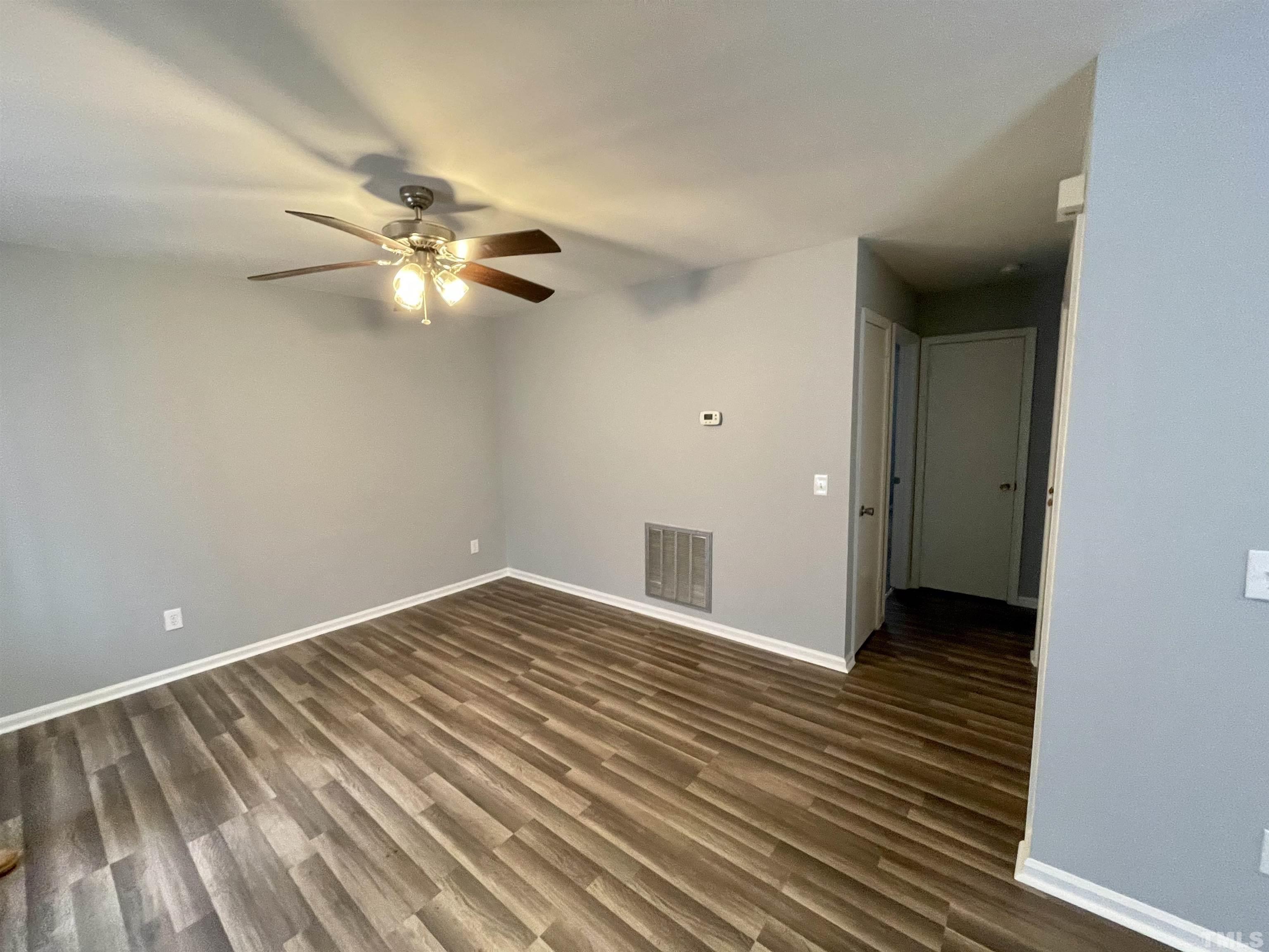 1421 Elm Street Roxboro, NC 27573 - Photo 3 of 13 wooden floor in an empty room