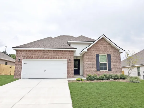 a front view of house with yard