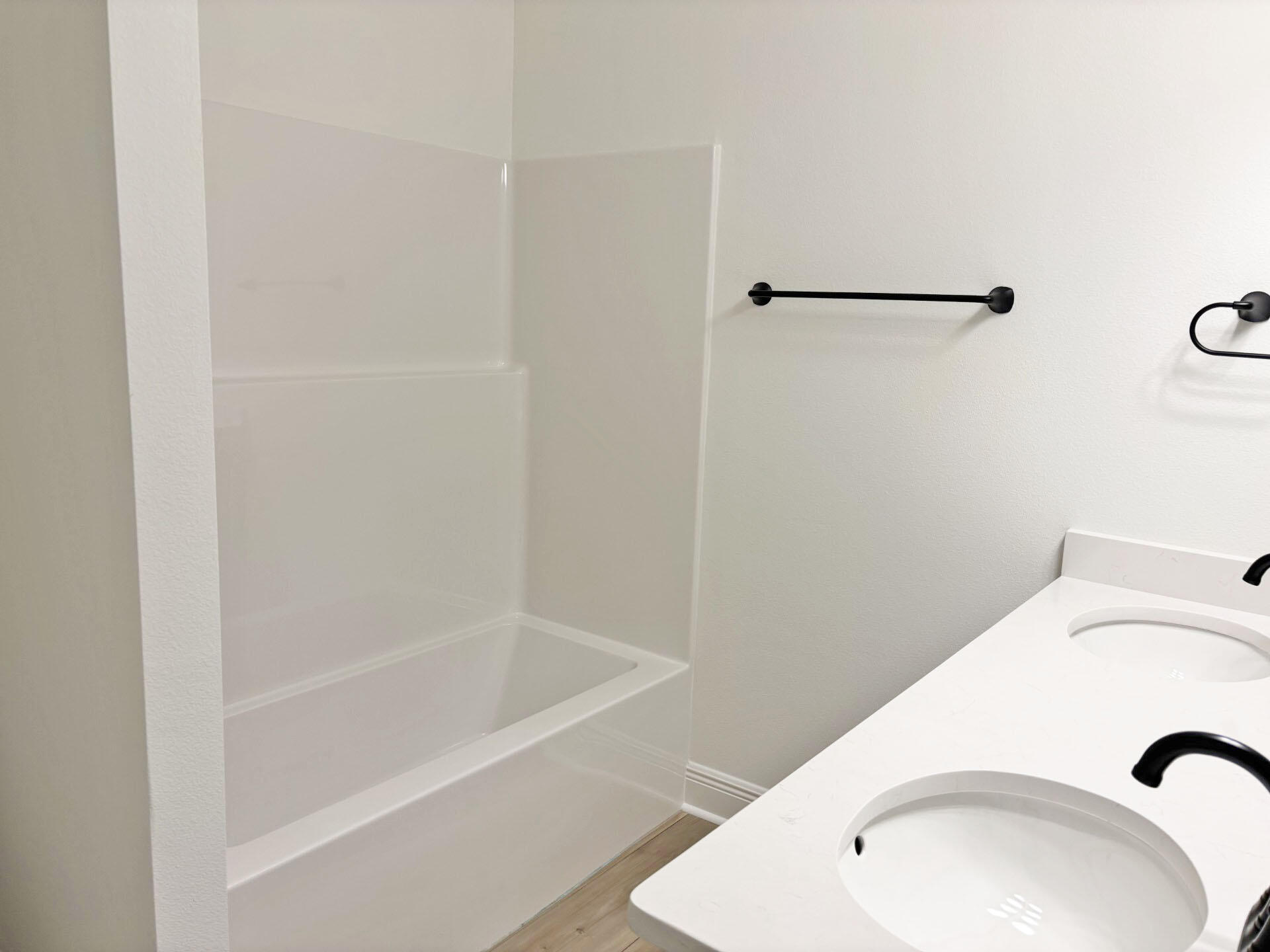 2745 Louis Circle Crestview, FL 32536 - Photo 13 of 18 a bathroom with a tub and shower