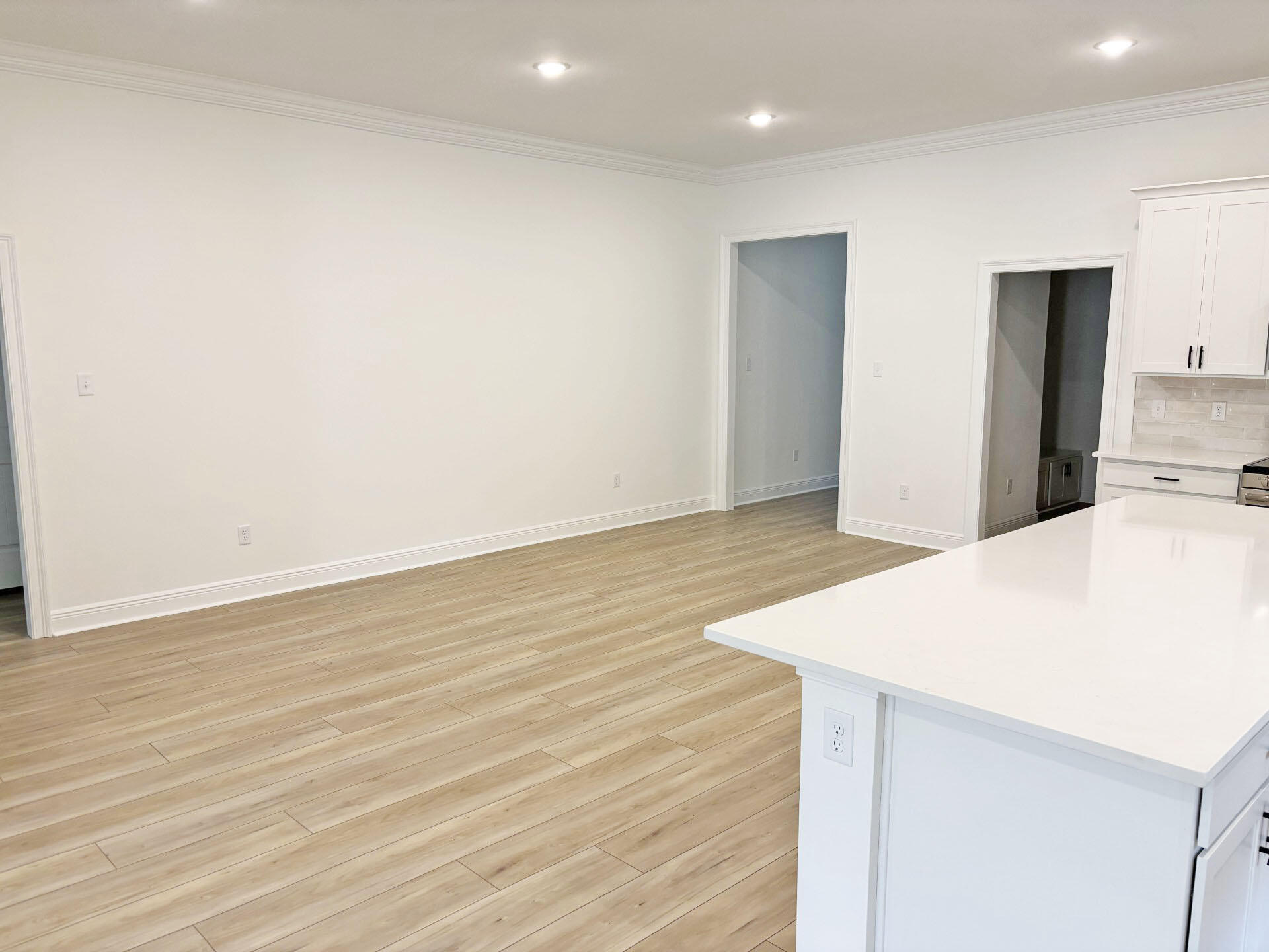 2745 Louis Circle Crestview, FL 32536 - Photo 6 of 18 an empty room with wooden floor