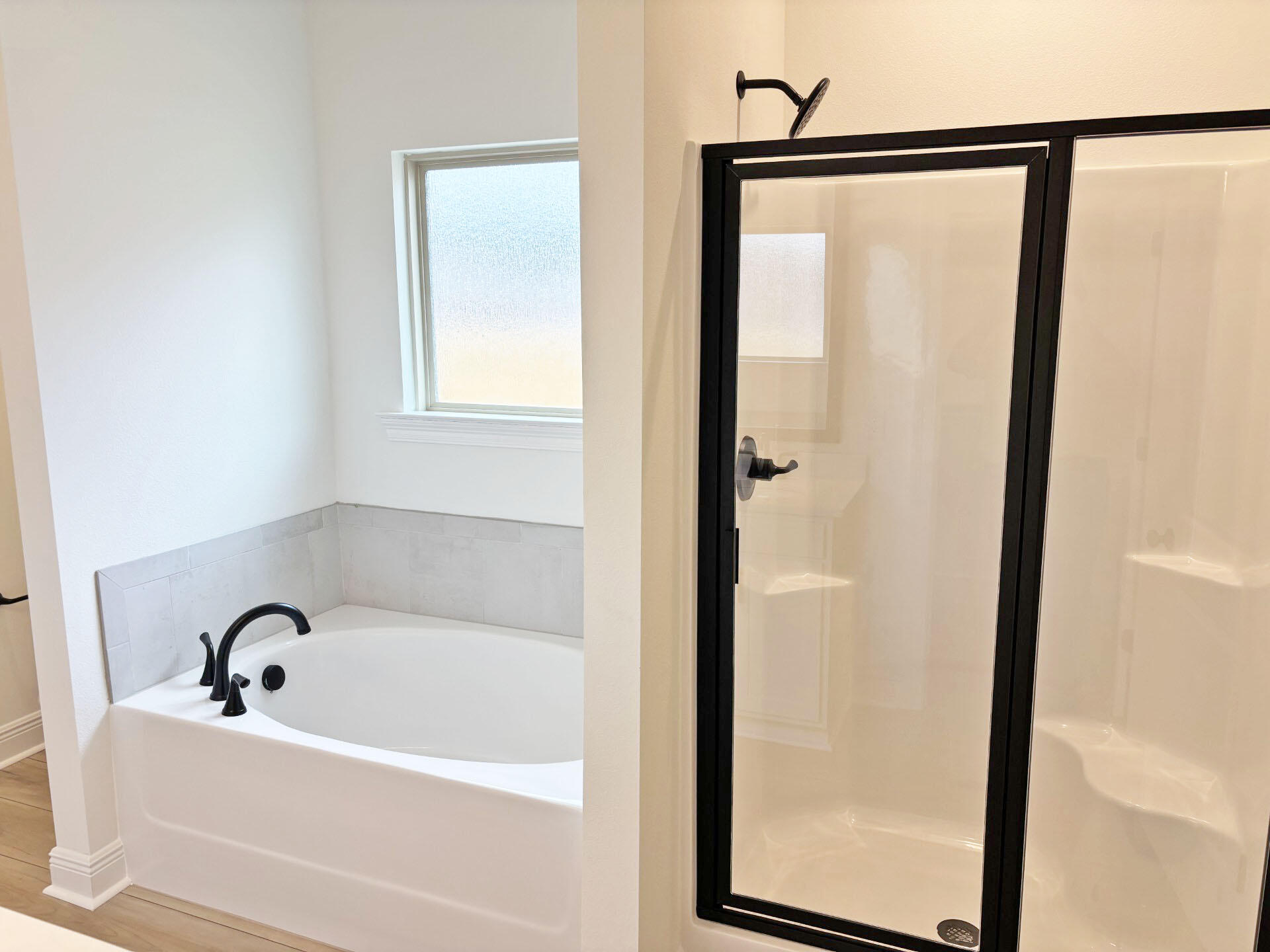 2745 Louis Circle Crestview, FL 32536 - Photo 9 of 18 a bathroom with a bathtub and a shower