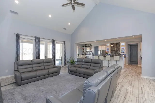 a spacious bathroom with a tub shower and sink