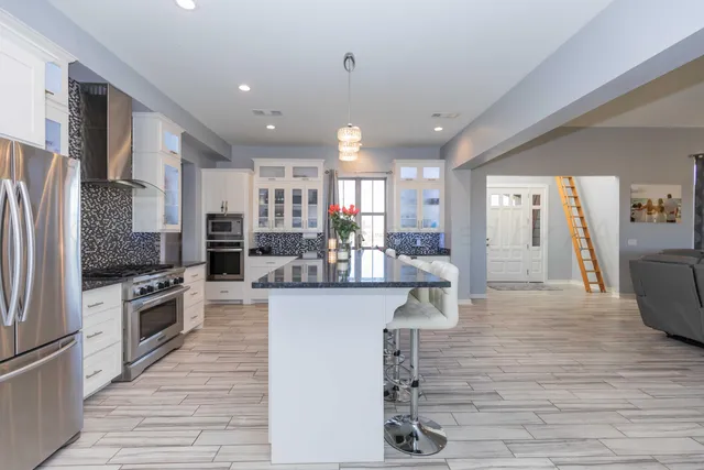 a bedroom with a workspace