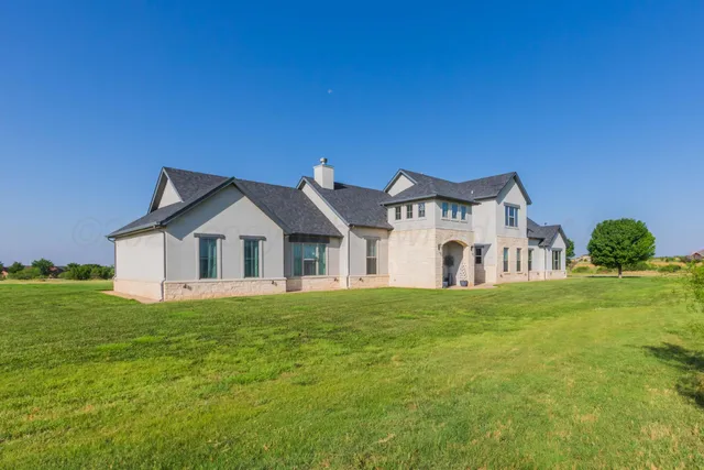 a view of a garden and lake