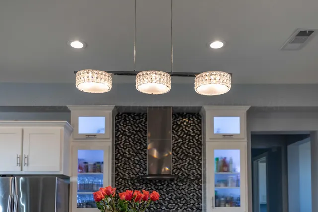 a view of a lake with houses in the back