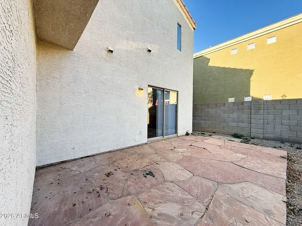 a view of a backyard of a house